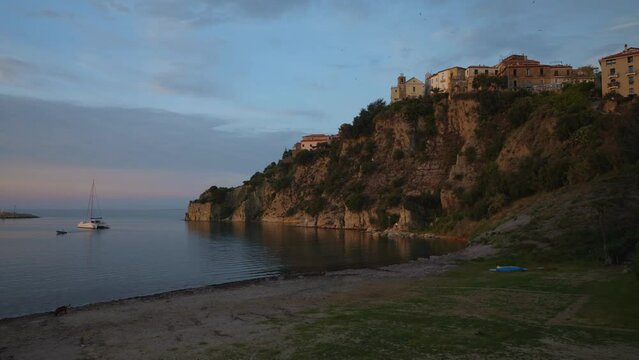 Old city on a cliff in Agropoli city at sunset.
