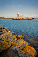Fototapeta na wymiar lighthouse at harbour