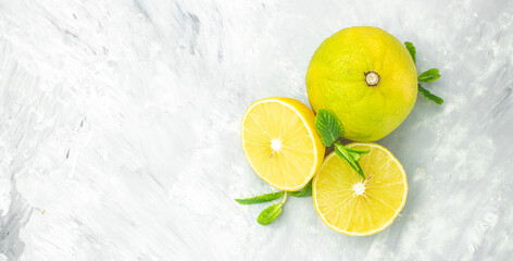 Fresh bergamot citrus fruits on a light background, Long banner format. top view