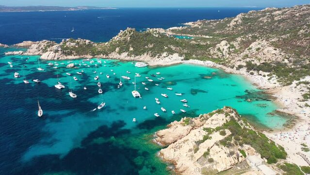 Stunning beaches and islands of sardinia with luxury yachts and boats over crystal water