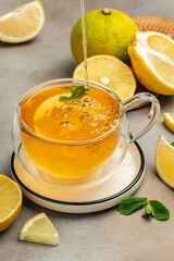 Bergamot tea drink and fresh bergamot, Clean eating, dieting, vegan food concept. top view
