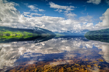 The reflection in the water on the fiord in Norway