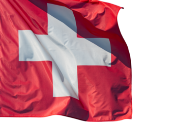 Country flag. Swiss flag. Switzerland flag against blue sky. One red square flag with a white cross in the centre. 
