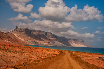 Fototapeta na wymiar Beautiful fantastic deserted landscape of rocky coastline and beach on the Indian Ocean. Socotra Island. Yemen.