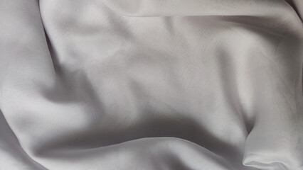 Fototapeta premium Abstract chiffon fabric background white texture from the waves and the irregularities that create the frame. Light, delicate, beautiful curtains