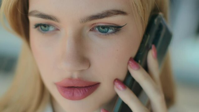 Headshot Caucasian woman girl speak mobile phone wireless cell connection female businesswoman talking by smartphone business converse discussing telling. Close-up face girl with makeup talk cellphone