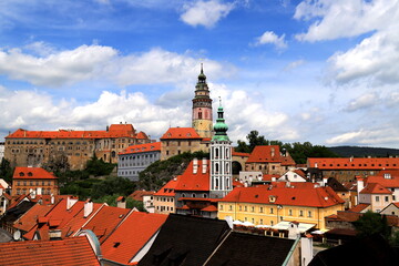 Fototapeta na wymiar Czech Republic, Krumlov. Historical Czech town, gothic architecture. Panorama of Cesky Krumlov, old buildings with red roofs. The beautiful amazing city on Vltava River.
