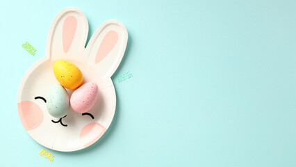 Naklejka na ściany i meble Happy Easter banner template. Cute Easter bunny plate with colorful eggs.