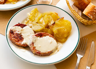 Fried turkey cutlets with stewed cabbage leaves