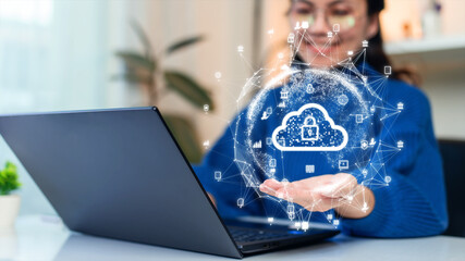 Woman uploading and transferring data from computer to cloud computing. Digital technology concept,...