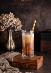 Food photography of coffee, iced, milk, cream, drink, beverage, refreshment,creamy, straw, cool