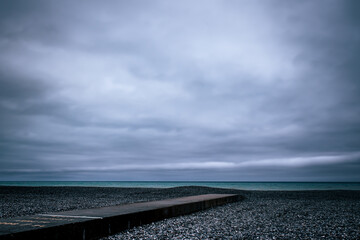 A dramatic shot of a beach in Normandy