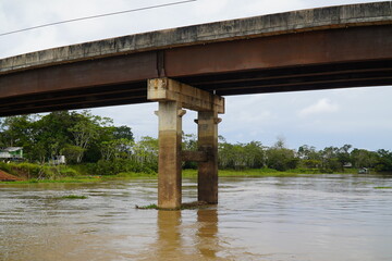 Collapsed bridge in Brazil of highway BR 319 over the Rio Curuca, A bridge pier was not anchored deep enough in the ground during construction and snapped off years later. Near Autazes, Amazonas.
