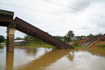 Collapsed bridge in Brazil of highway BR 319 over the Rio Curuca, A bridge pier was not anchored...