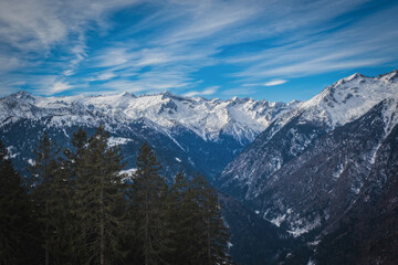The Dolomites mountains in beautiful winter day. Pinzolo ski resort, Italy. January 2023