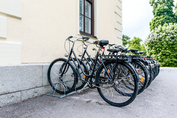 Black bicycles in a row