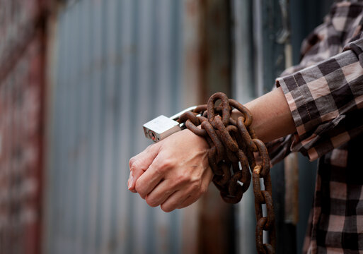 Asia Woman trapped in cargo container wait for Human Trafficking or foreigh workers, Woman holding master key wait for holp help, woman chained to her wrist