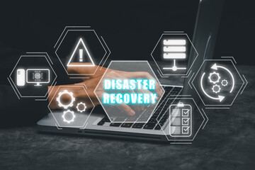 Disaster Recovery concept, Person hand using laptop computer with Disaster Recovery icon on virtual...