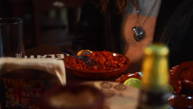 Serving a Plate Full of Pastor Meat at an Authentic Mexican Taco Restaurant