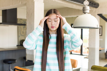 asian pretty woman at new home living room