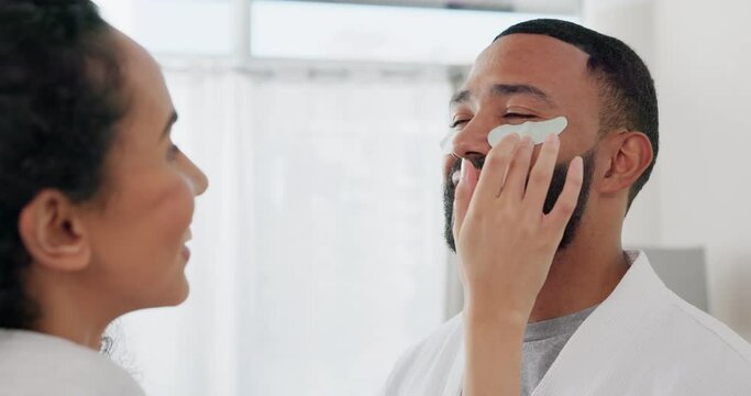 Couple, Eye Patches And Smile For Skincare Beauty Or Cosmetics In Morning Bathroom Routine Together At Home. Happy Man With Woman Applying Cosmetic Product, Face Mask Or Patch For Healthy Wellness