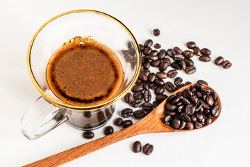 Espresso coffee morning homemade has bean on white wood table.