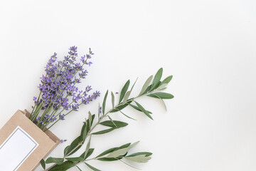 Lavender product presentation. Lavender flowers on a white background. Top view concept.