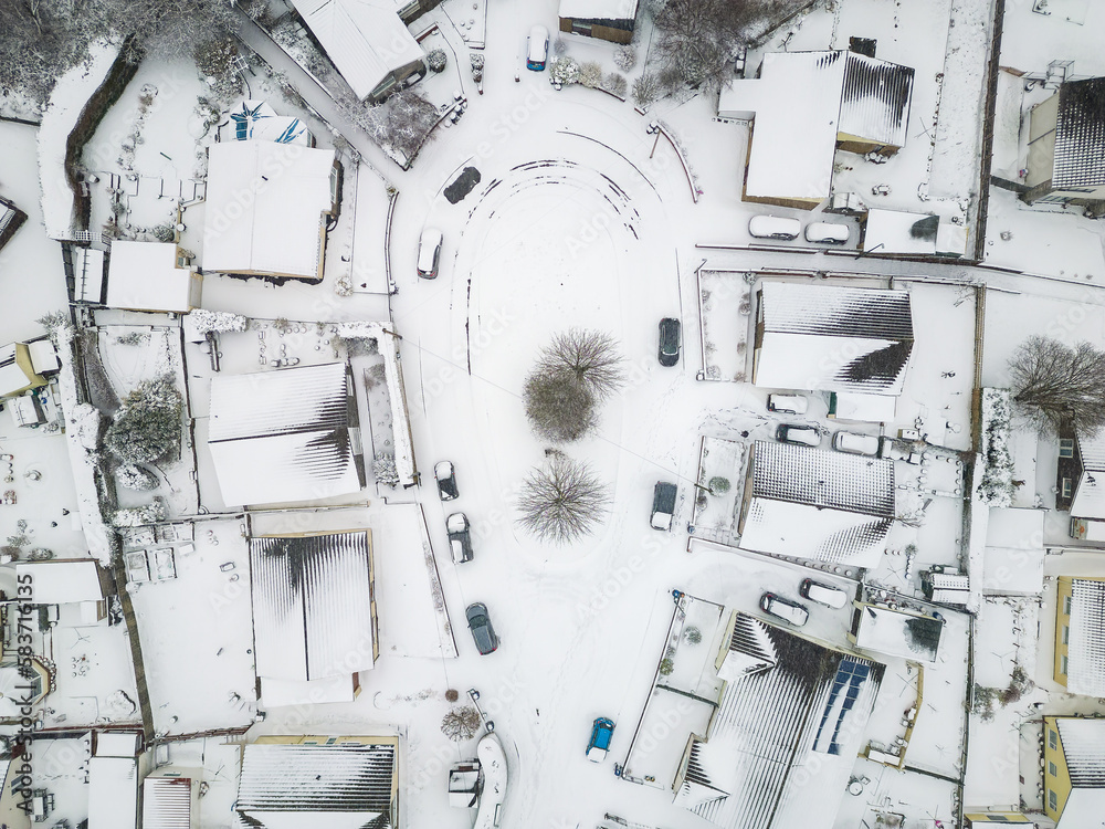 Poster aerial view of snow covered streets and roads during a blizzard (wales) - Posters