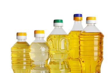 Bottles of cooking oil on white background