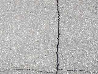 Obraz premium 道路のひび割れ