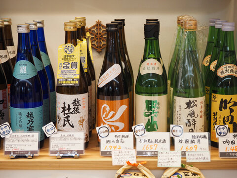 TOKYO, JAPAN - March 19, 2023: Bottles Of Sake On Display At The Front Of A Store Selling Products From Niigata Prefecture.
