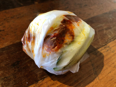 Nasi lemak wrapped with transparent plastic