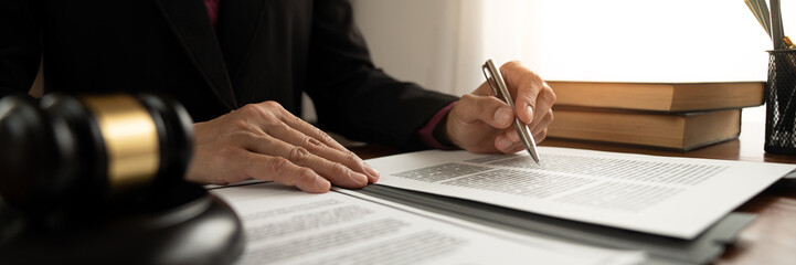 Female lawyer, legal consultant, asian businesswoman checking documents before signing venture capital business finance legal services concept in office.