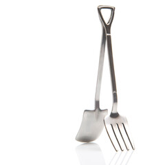 decorative fork and spoons in the form of spades on a white background. food tools.