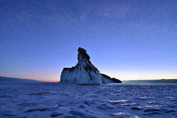 Dragon Tail Rock Under the Milky Way Galaxy at Frozen Lake Baikal