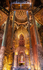 Fototapeta na wymiar Wooden carving sculptures inside of the Sanctuary of Truth temple in Pattaya, Thailand