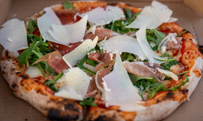 Prosciutto Arugula and Parmesan Pizza