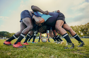 Rugby fitness, scrum or men training in stadium on grass field in match, practice or sports game. Teamwork, ball or strong athletes in tackle exercise, performance or workout in group competition