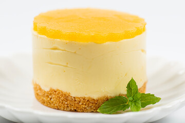Creamy petite mango cheesecake with mango jelly and a wholewheat biscuit crumb base.