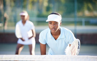 Tennis, sport and serious black woman on outdoor court, train and fitness, collaboration and ready...