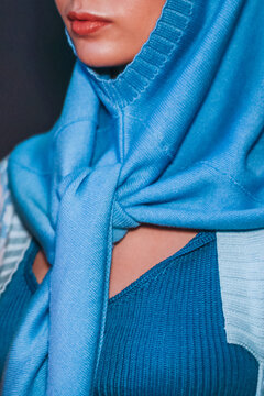Fashion details of a women's blue knitting capar scarf headwear