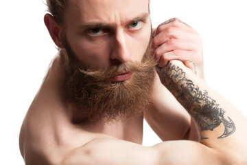 Obraz premium Hipster with long beard on white background in studio photo