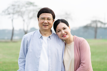 Elderly Asian couple in the park