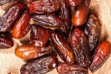 Dried fruits on wooden background in studio photo