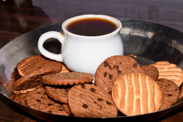 Biscuit and Tea on the wooden table background