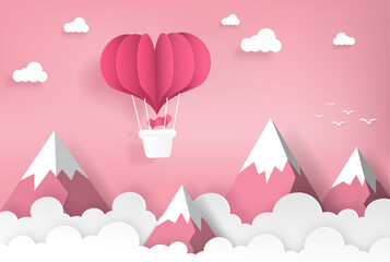 hot air balloons at heart shape flying on the mountain and sky. origami paper art and valentine concept.