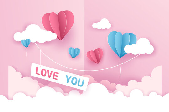 hot air balloons at heart shape flying on the mountain and sky. origami paper art and valentine concept.