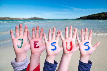 Children Hands Building Word Jesus, Ocean And Sea