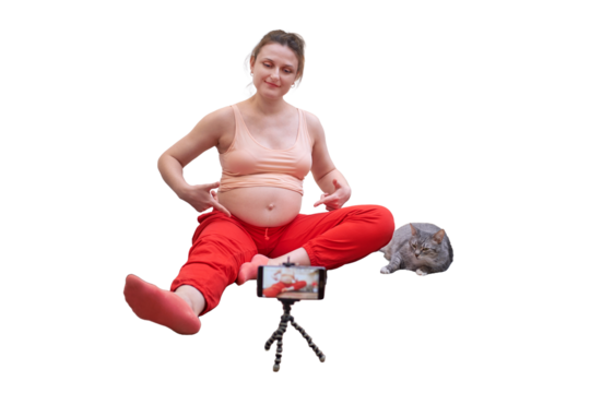 Yoga at home during pregnancy and online training course, isolated on a white background. Pregnant woman on workout shows exercises on video from the Internet via phone