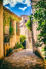 Street in the old town of Tossa de Mar, Spain